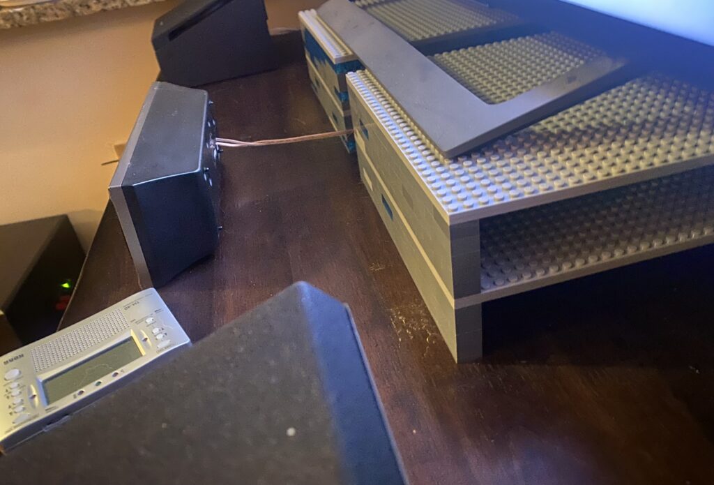 Designed and built a weight-bearing shelf out off lego-like bricks.