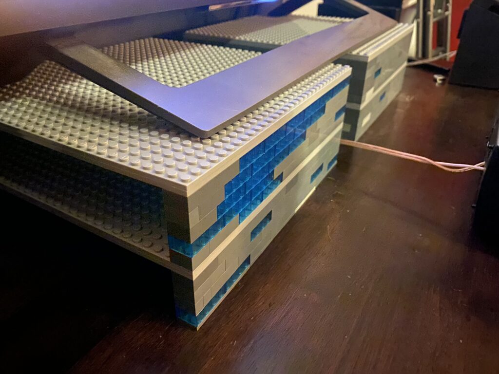 Designed and built a weight-bearing shelf out off lego-like bricks.